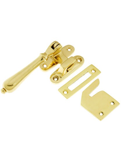 Solid Brass Casement Window Latch With Pendant Handle In Polished Brass.